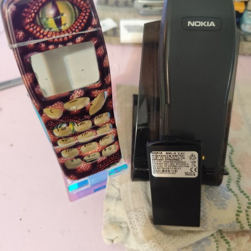 Nokia 3210 vintage cell phone used with new battery and front cover