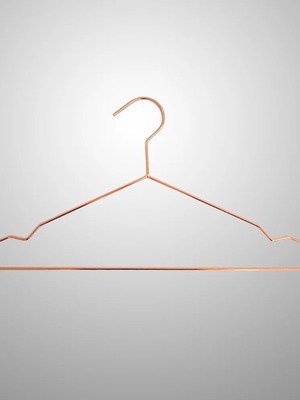 Metal hangers copper color set of 9 like new