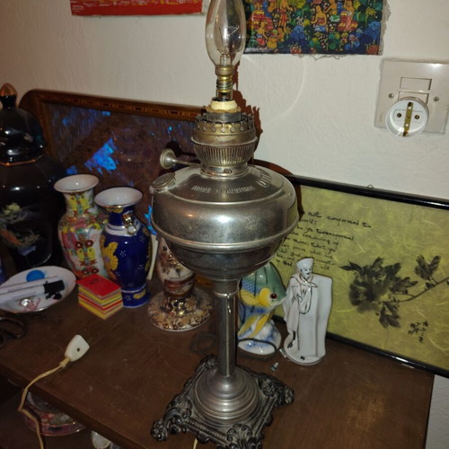 Lamp converted into adjustable light fixture
