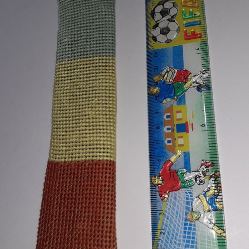 Handmade embroidered bookmark in red, yellow and light blue