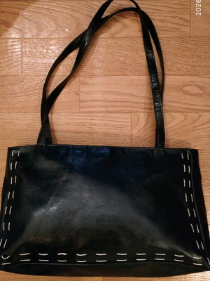 Women's black handbag and shoulder bag with whipstitch used