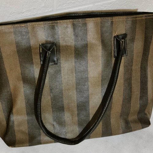 Handbag used with beige-brown stripes, plastic fabric