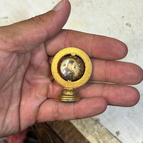 Vintage bronze magnet with double-sided Christian icon used