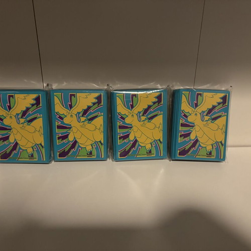 Pokemon card sleeves, 11 packs from different sets