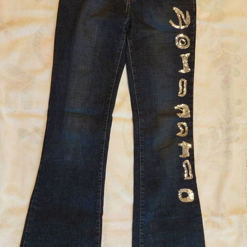 Dark blue jeans with silver bird design, like new, size S