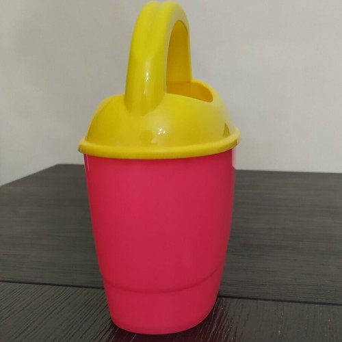 Children's watering can toy like new, height 18 cm, width 18 cm