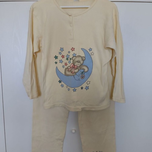 Girls' pajamas used yellow with teddy bear