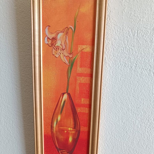 Decorative framed canvas print used, flower in glass vase