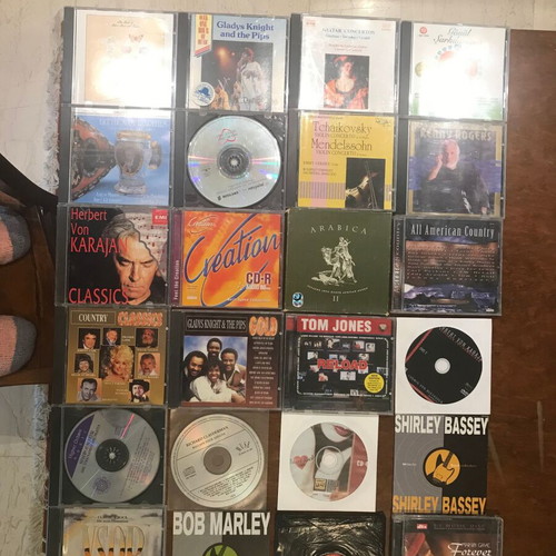 CDs of foreign music like new, 163 singles, doubles & triples