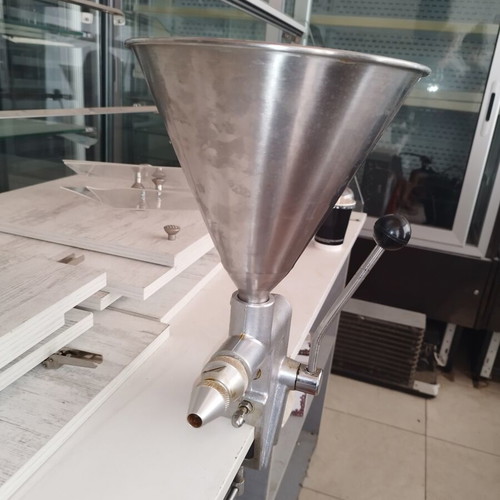 Manual dough depositor with stainless steel hopper and lever