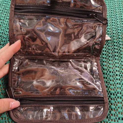 Azzaro Paris travel pouch with animal print design