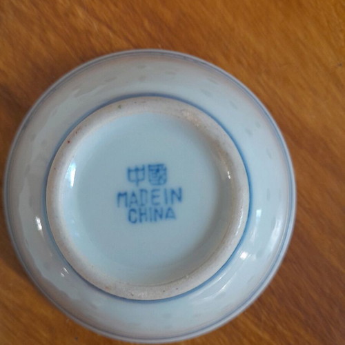 Porcelain plates and miniature bowls, old unused