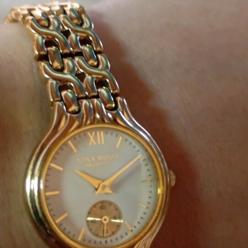 Nina Rossi wristwatch gold like new, women's