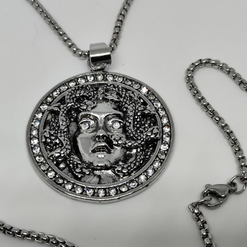 Medusa Pendant in Steel like new with rhinestones and chain