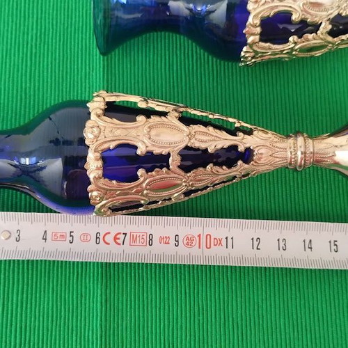 Pair of cobalt glass vases used with silver bases