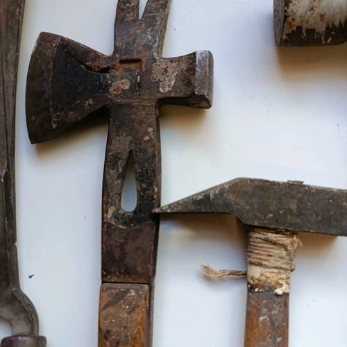 Set of old handmade tools used with wooden handles