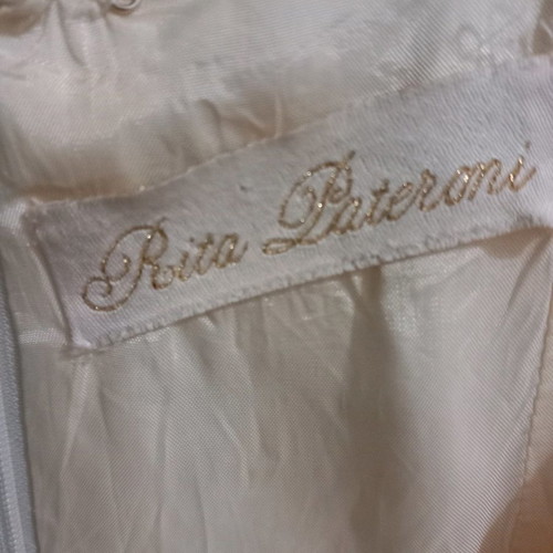 Rita Pateroni official dress white like new with black satin belt