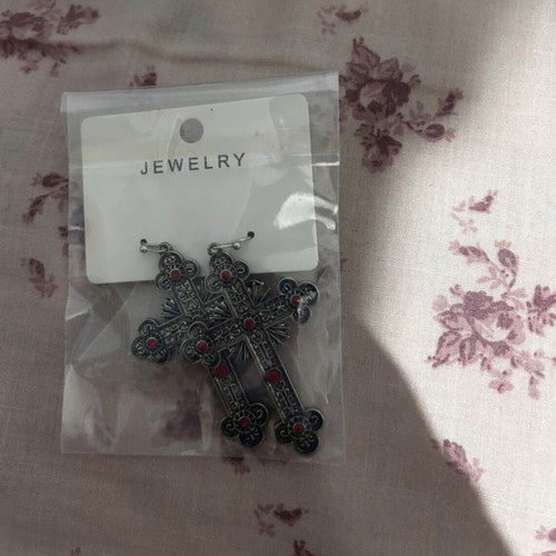 Cross earrings like new with red phosphorescent details
