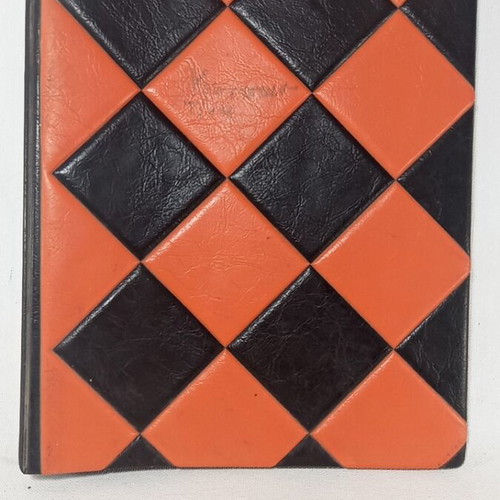 Vintage photo album used, orange and black checkered