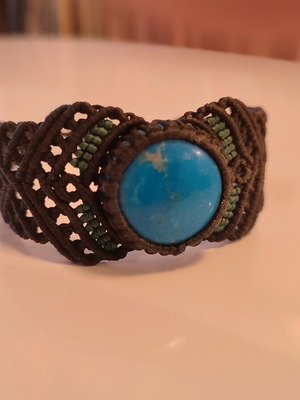 Macrame bracelet like new with blue stone, black