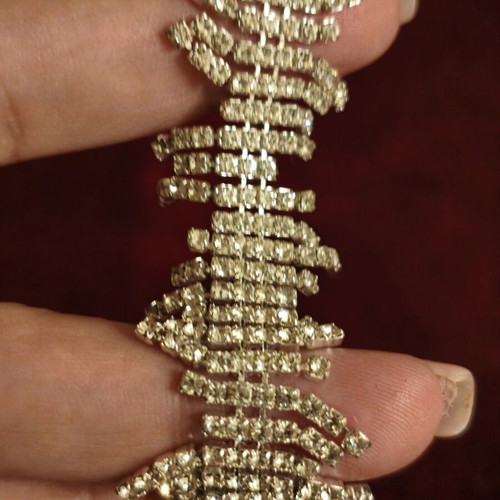 Bracelet with rhinestones like new, wavy design