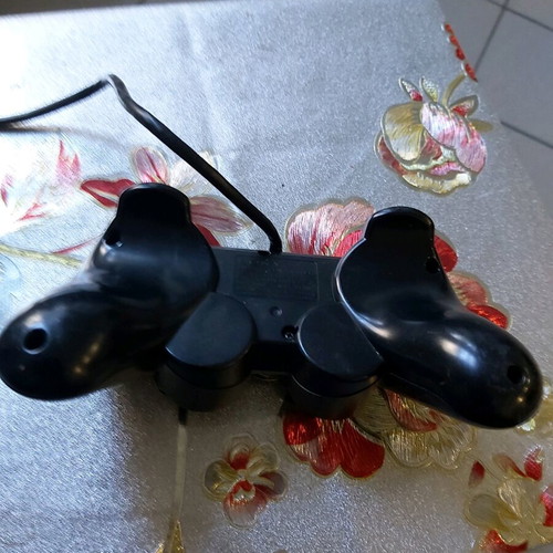 PlayStation 2 controller used, functional condition