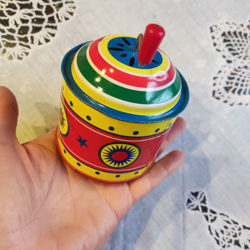 Vintage tin music box with hand crank like new
