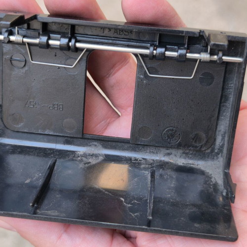 Mercedes W211 trunk lock cover plastic