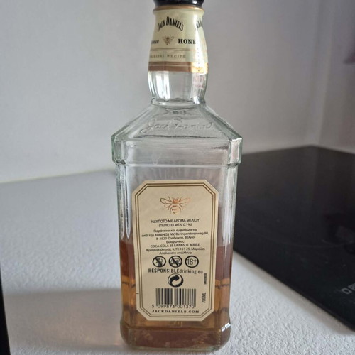 Jack Daniel's Honey Whiskey used, half full