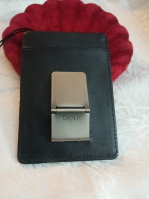 DKNY pin with metal clip like new