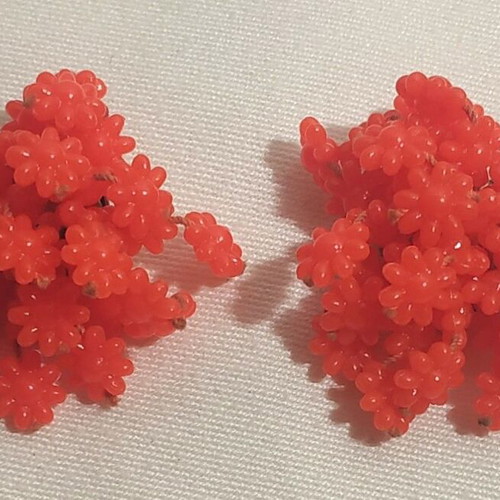 Clip-on earrings used, orange-red color