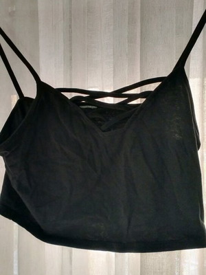 Black top used with cotton fabric, size S
