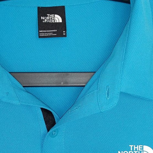 The North Face polo shirt like new, medium, blue