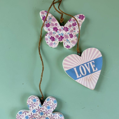 Handmade hanging decoration with butterfly, heart and flower wooden motifs