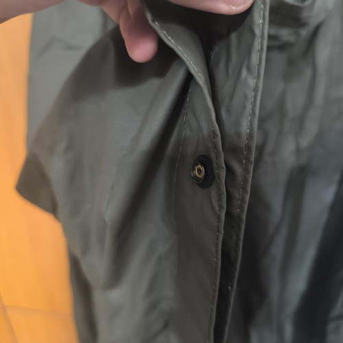 Military poncho used with all buttons functional