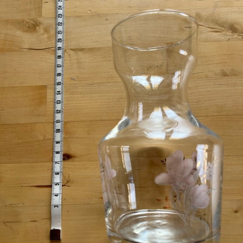 Glass bulb vase used with botanical detail