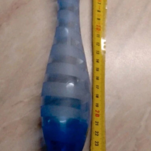 Glass vase decorated with natural shells like new