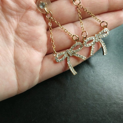 Bow earrings dangling new