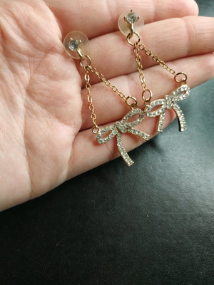 Bow earrings dangling new