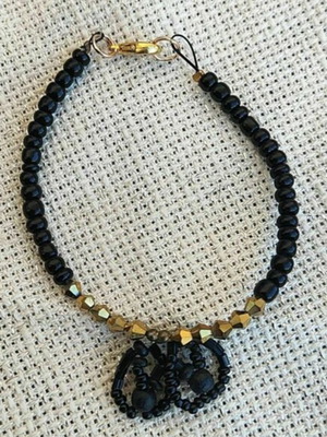 Black woven bracelet new with beads and crystals