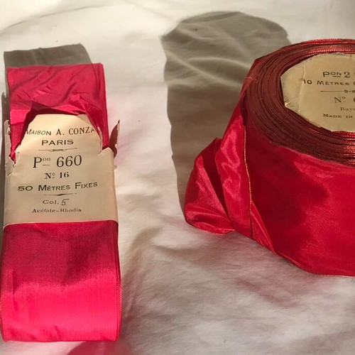 2 rolls of ribbons new in rose and fuchsia shades