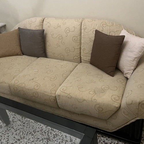 2 sofas with a free armchair