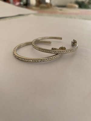 Folli Follie earrings with small wear
