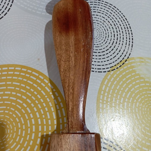 Handmade wooden Madonna statue in praying pose with halo
