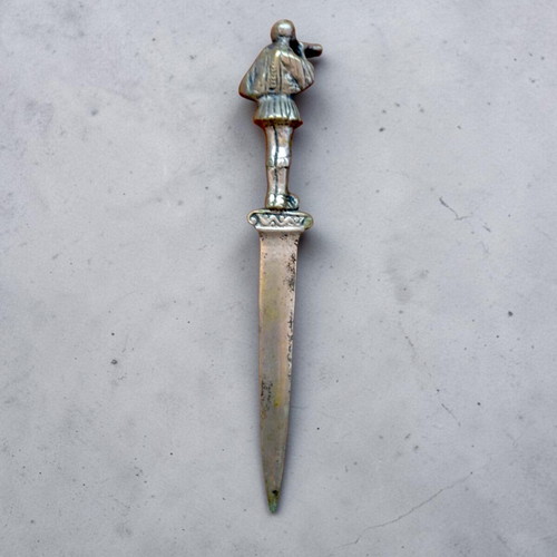 Vintage collectible letter opener with tsolias figure used