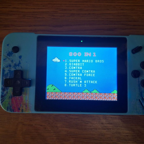 Game Box G3 handheld console used, 800-in-1, blue splatter design