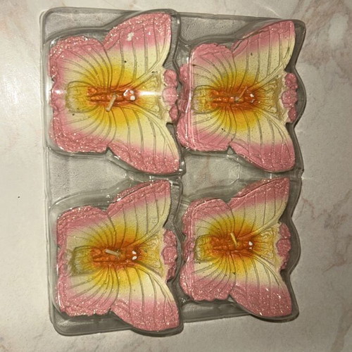 Butterfly candle like new, pack of 4 pieces