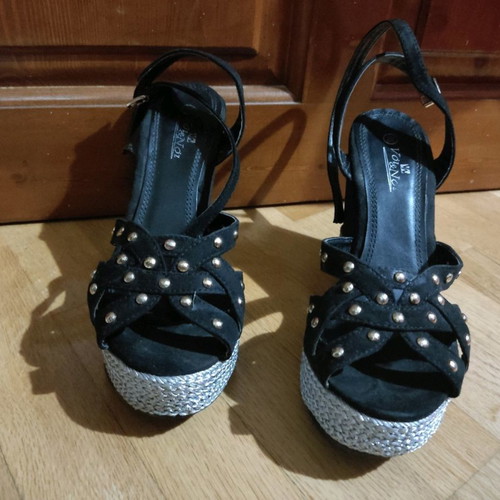 Platform shoes used with studs and double ankle strap