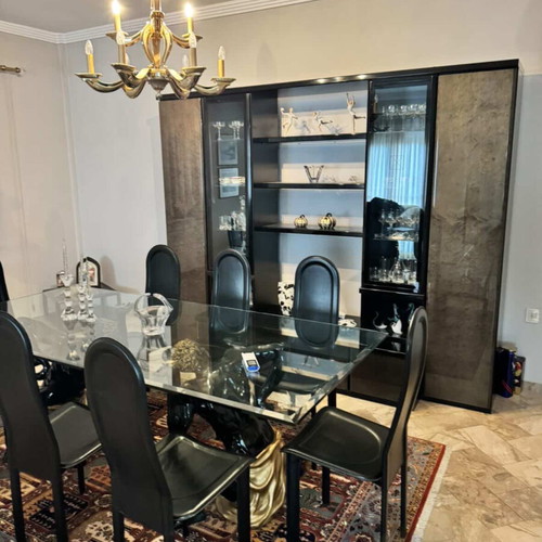 Dining table with 8 leather chairs and sideboard like new