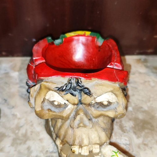 Ashtrays various figures used, pack of 6 with skull and reggae